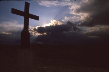 Lone Cross atop a mountain in east central California, hope of a sunny day breaking through.