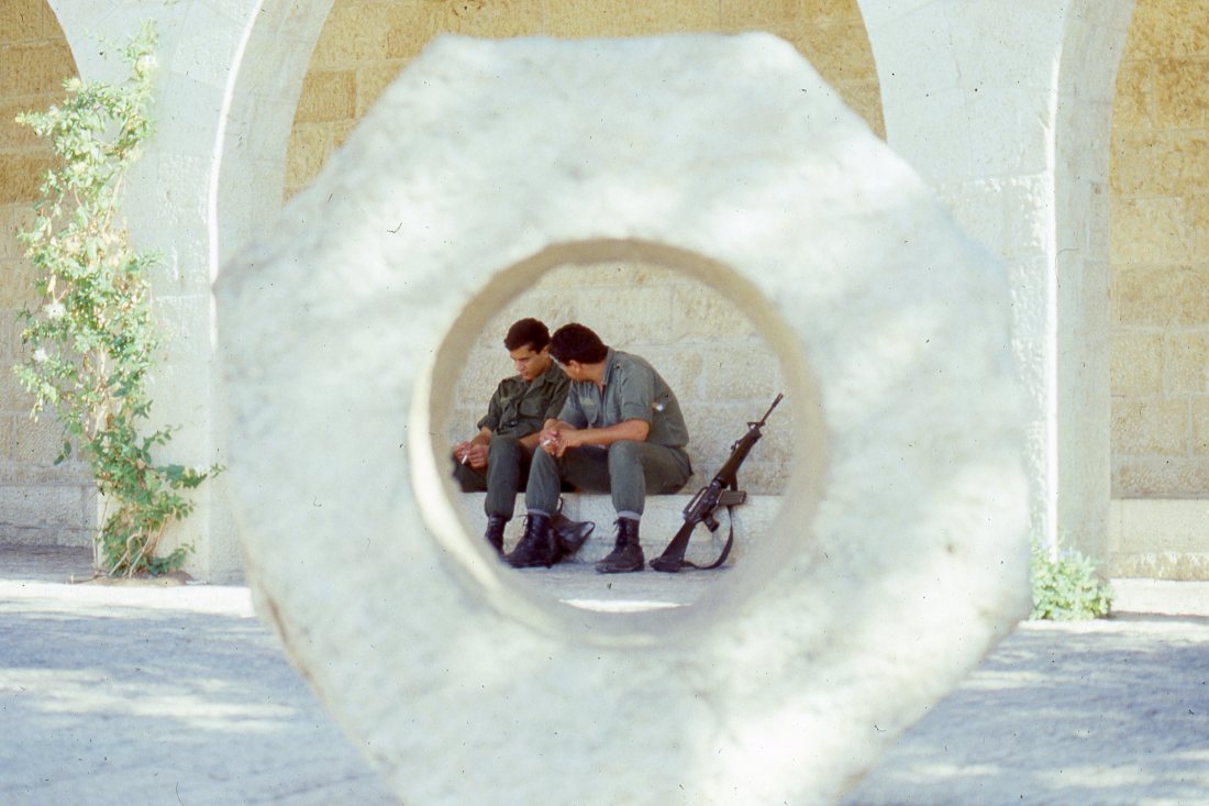 Israeli Defense Force soldiers take a break. Jerusalem 1986. (C) Wil Robinson